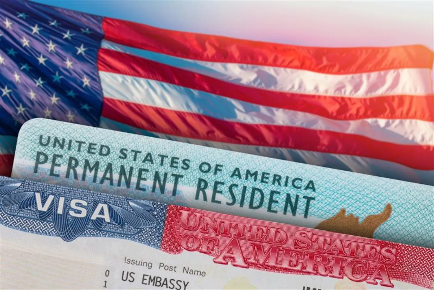 A picture with an American flag, a green card, and a visa